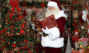 Santa Paul checking the Naughty & Nice Book