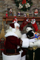 Santa Paul admiring the elves' handiwork