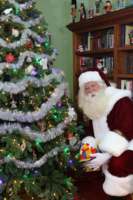 Santa Paul leaving presents on Christmas Eve